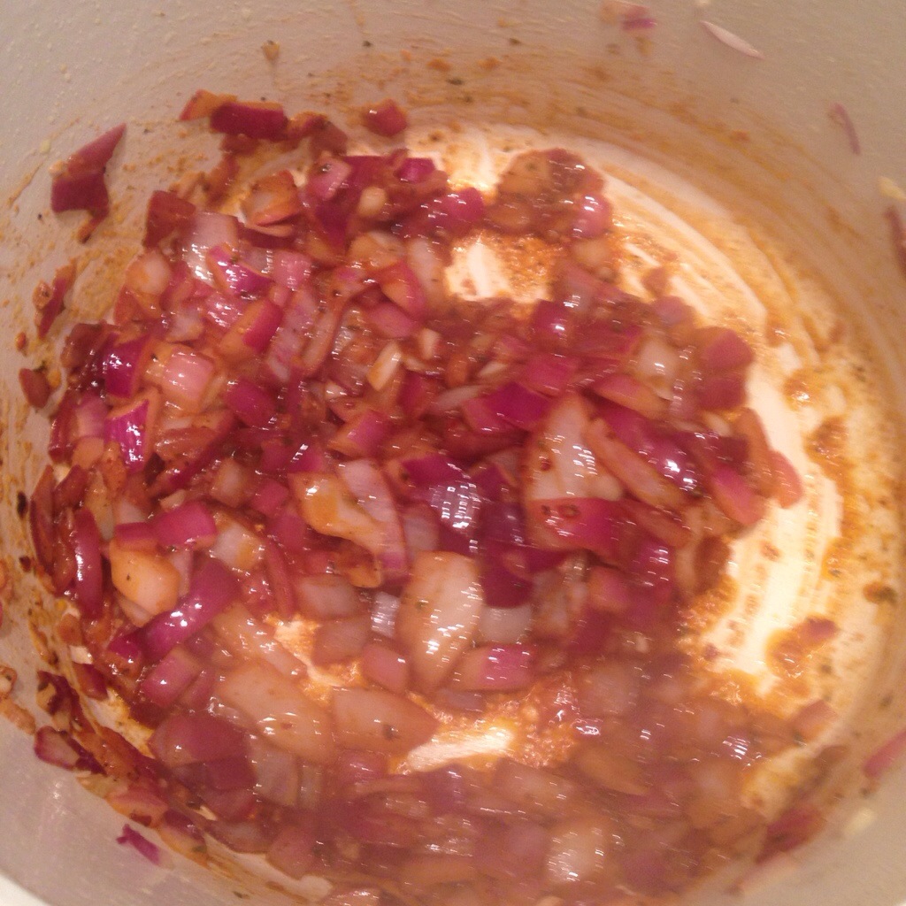 Spices simmering in garlic and onions