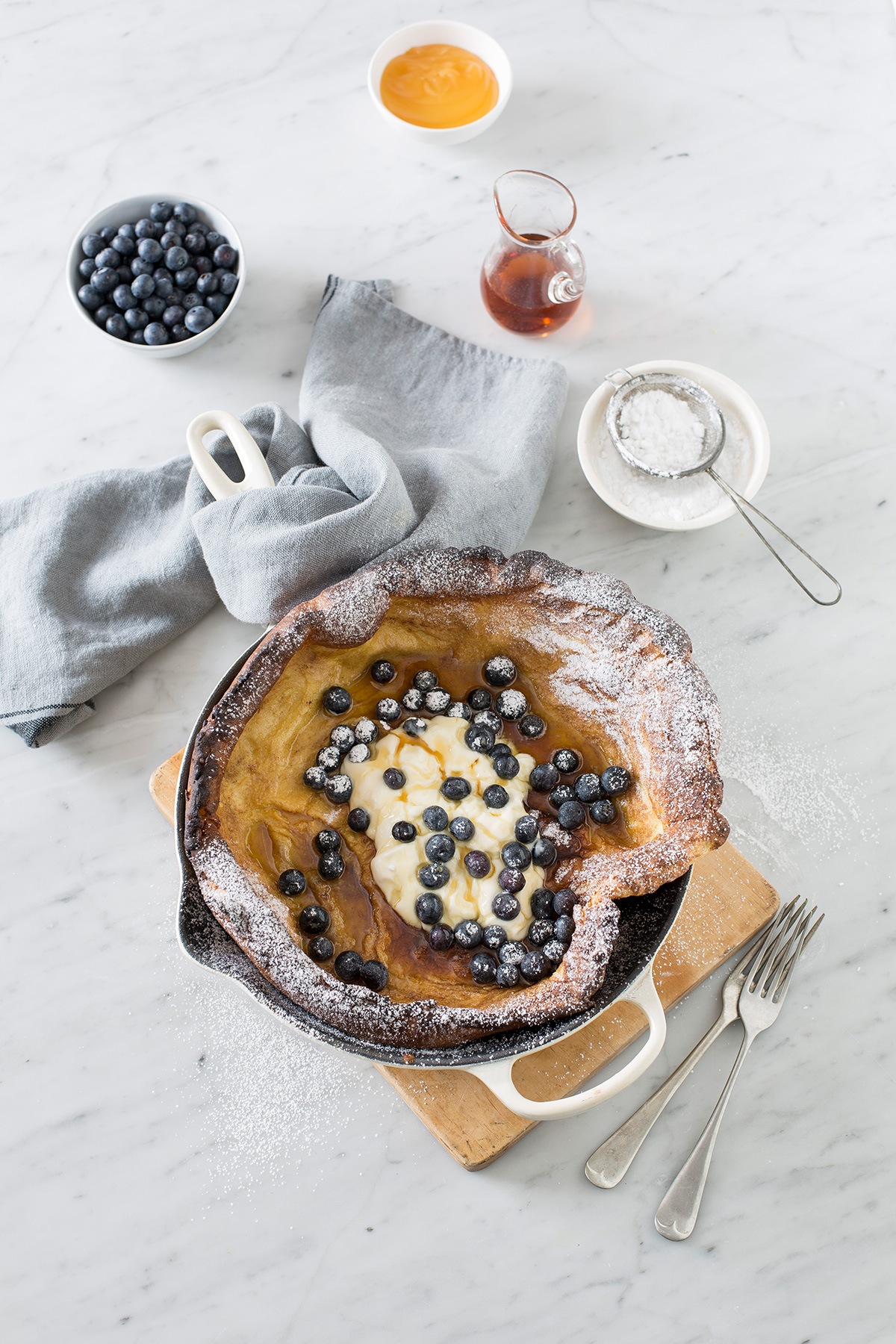 Brown Butter Dutch Baby Pancake with Blueberries & Lemon
