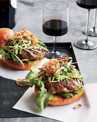 Cheddar-Stuffed Burgers with Pickled Slaw and Fried Shallots